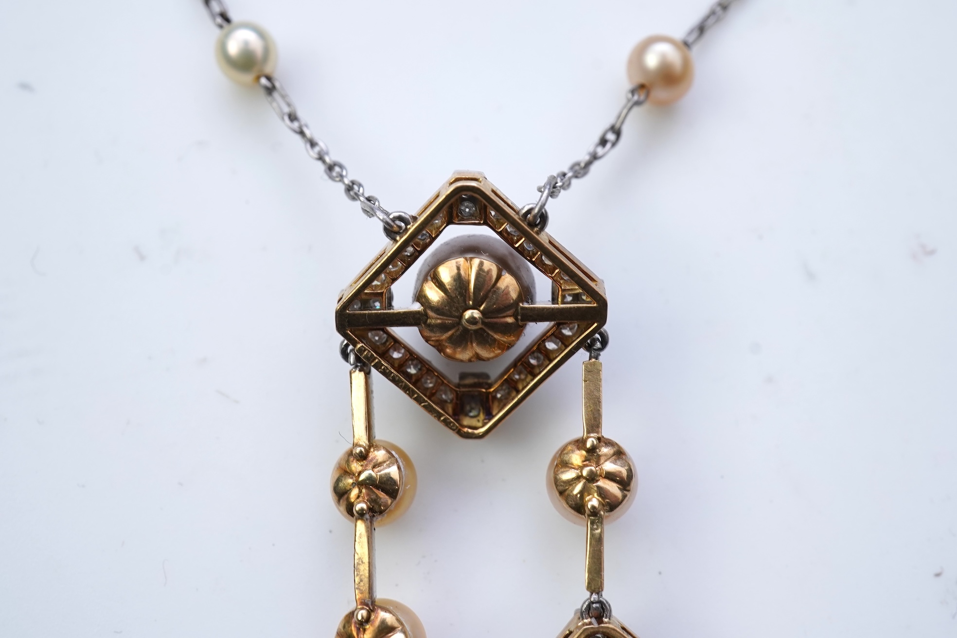 An Art Deco sapphire, natural pearl and diamond necklace, circa 1920